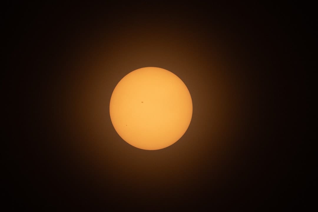 Photo by Howard R Wheeler the sun seen through a telescope lens