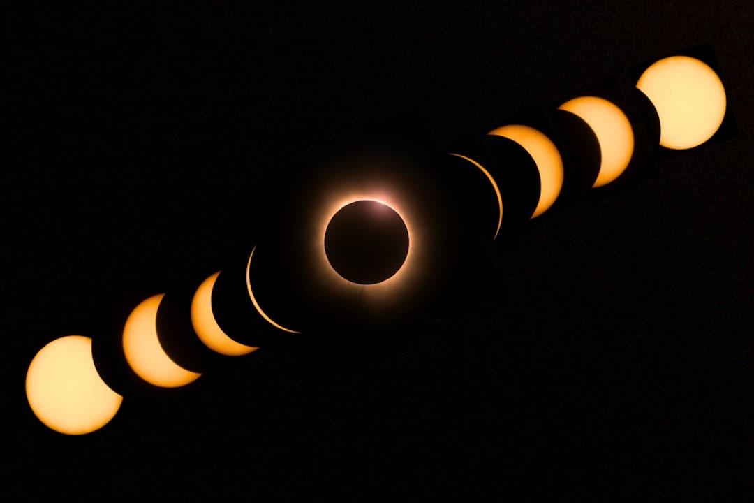 Photo by Daniel Gomez a solar eclipse is seen in the dark sky